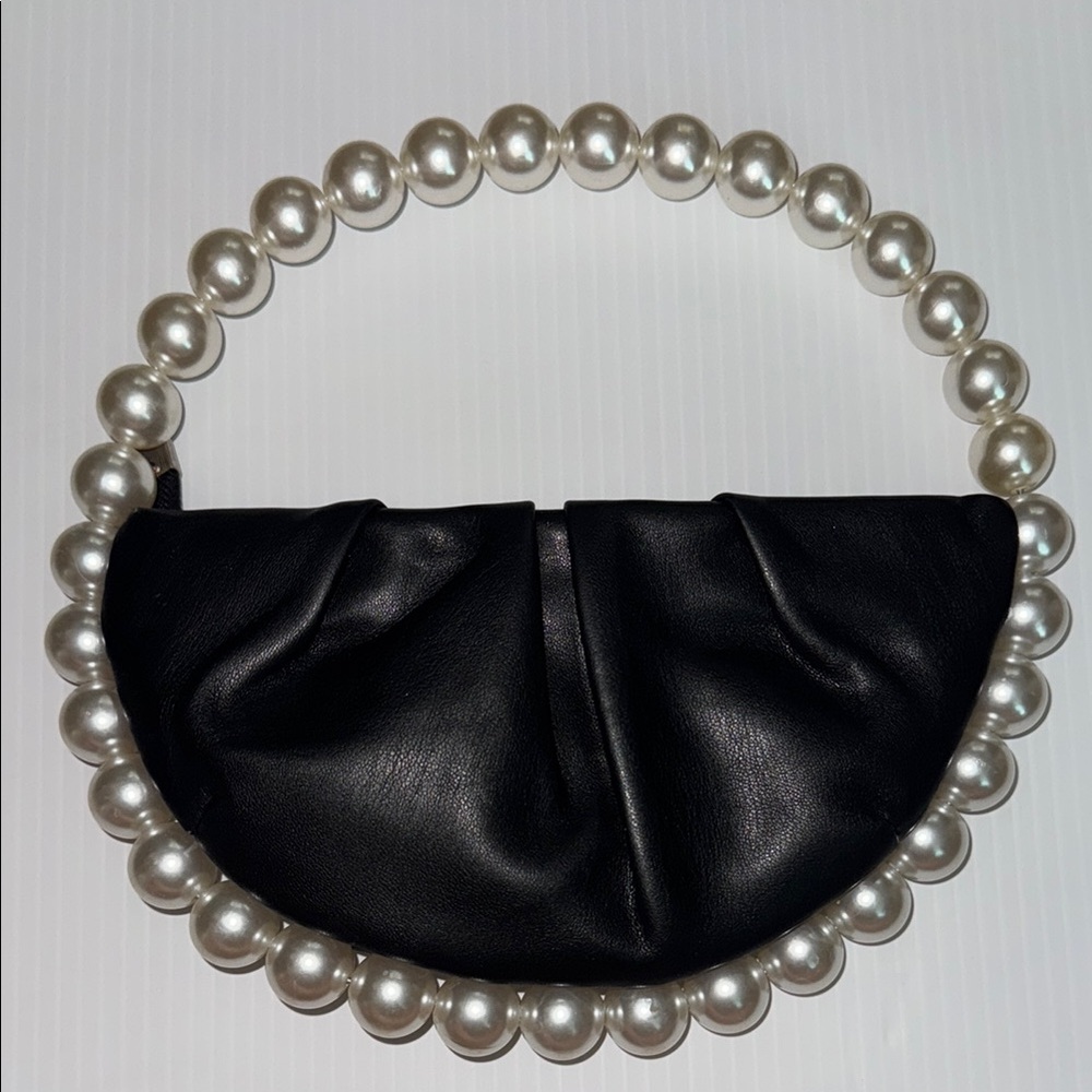 Elegant Black Pearl Handle Clutch